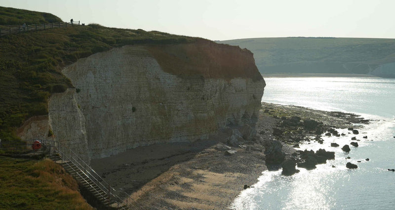 florence bowdige dancing at cuckmere haven beach wearing sula clothing at summer solstice